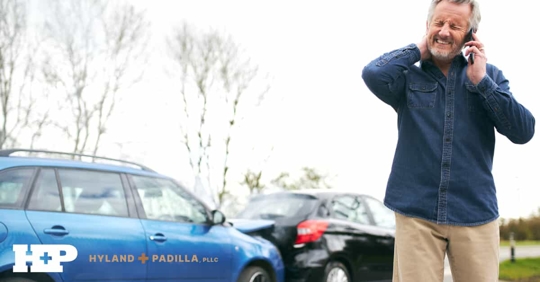 Man Holding His Neck Following a Car Accident