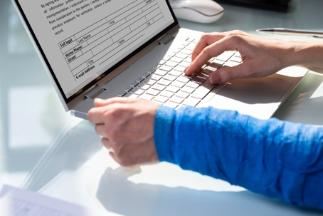 Person with bandage on arm at work
